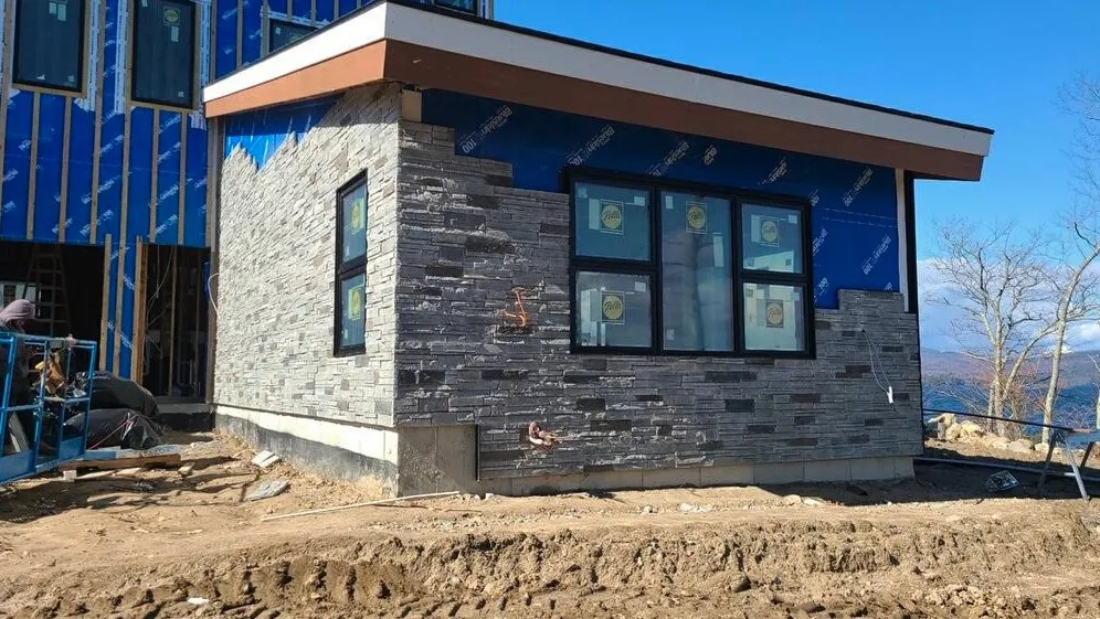 Slide of Olympic Roofing