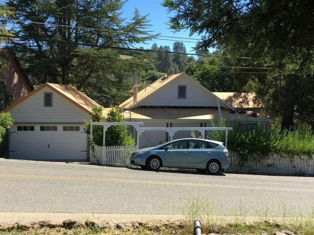 Slide of Olympus Roofing