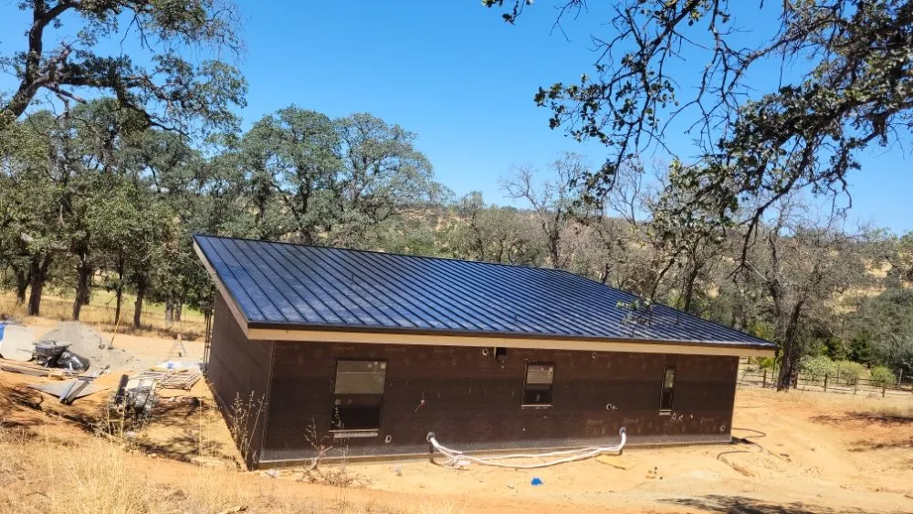 Slide of Olympus Roofing