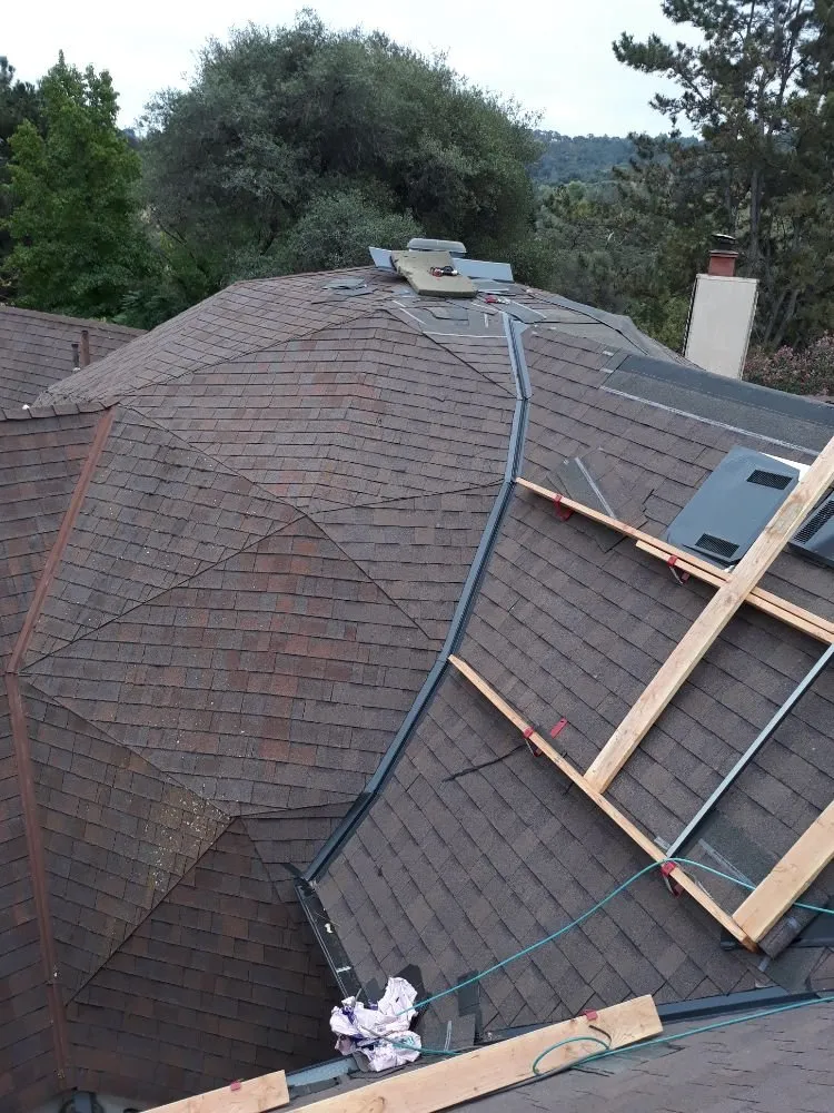 Slide of Olympus Roofing