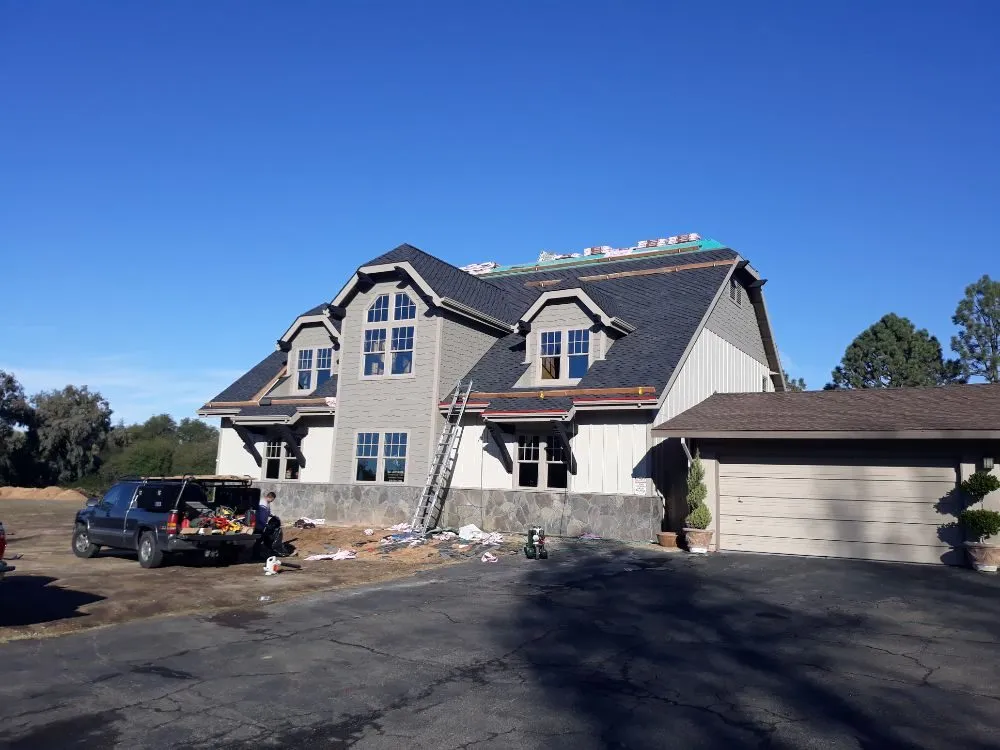 Slide of Olympus Roofing