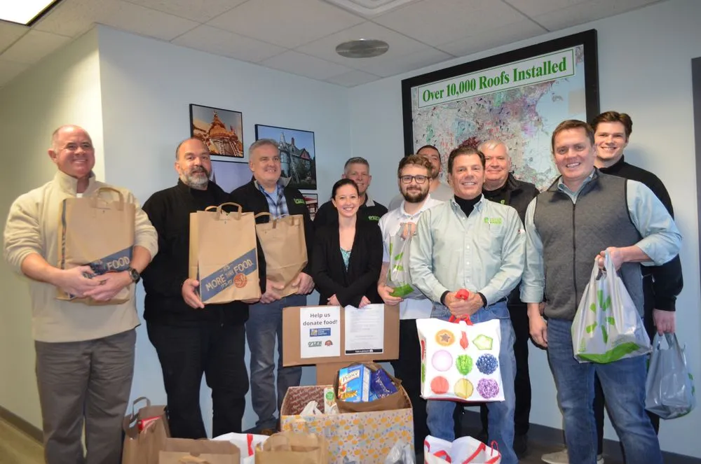 Slide of O'LYN Roofing