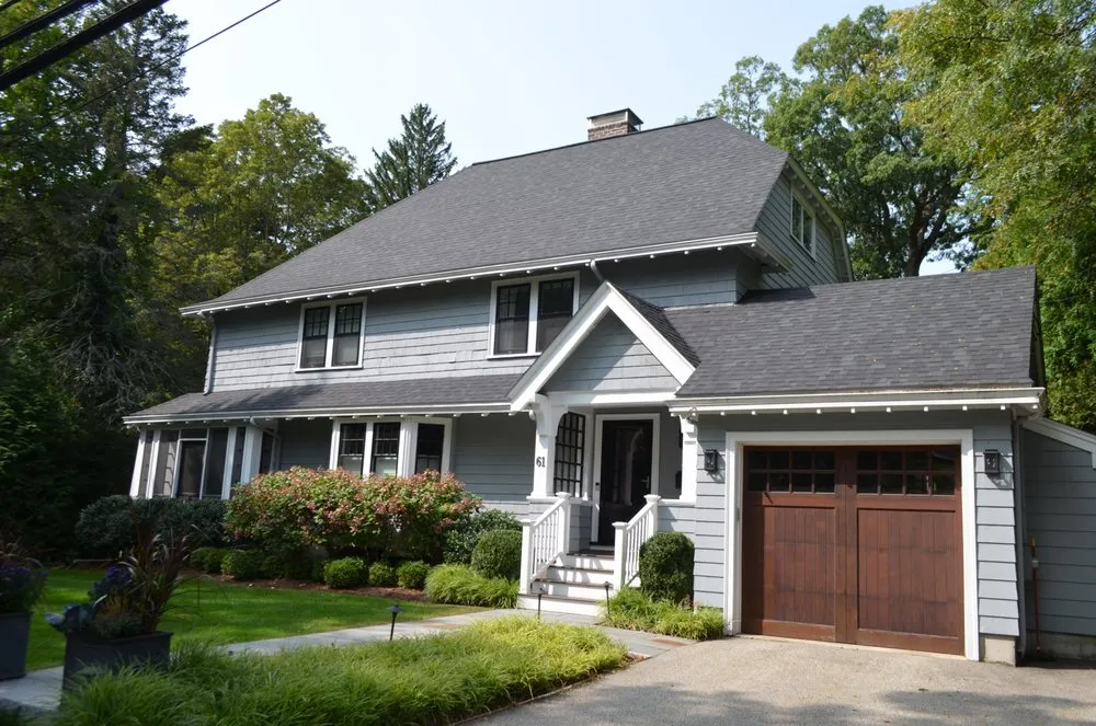 Slide of O'LYN Roofing