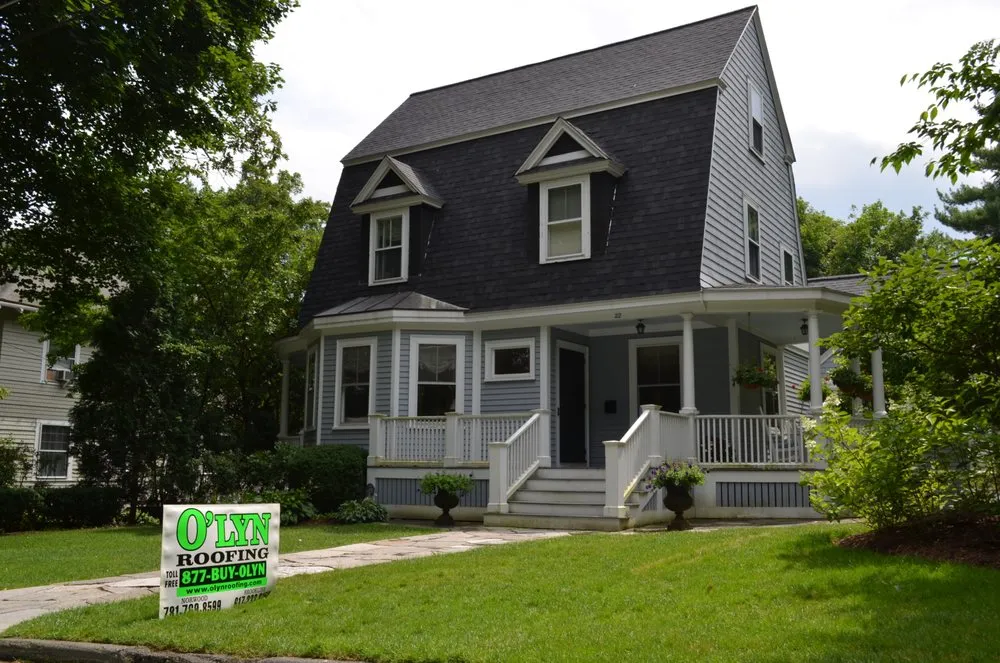 Slide of O'LYN Roofing