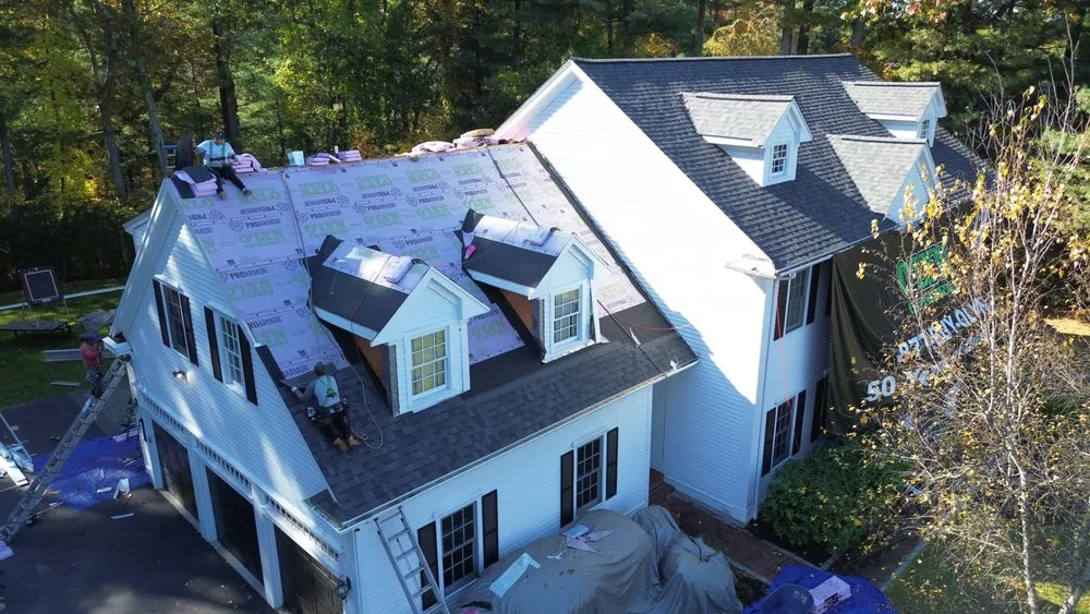 Slide of O'LYN Roofing