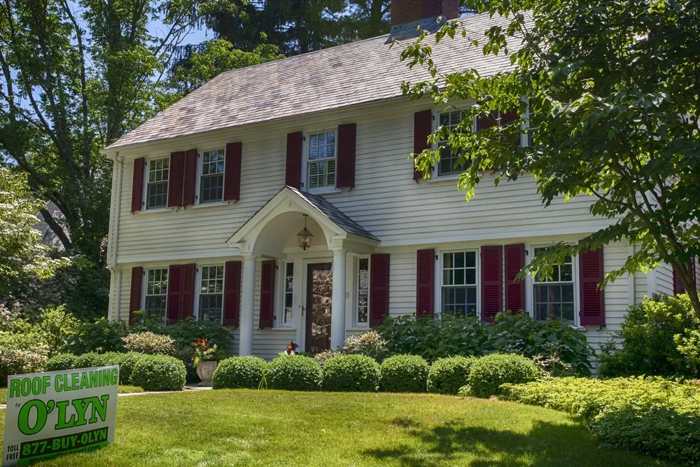Slide of O'LYN Roofing