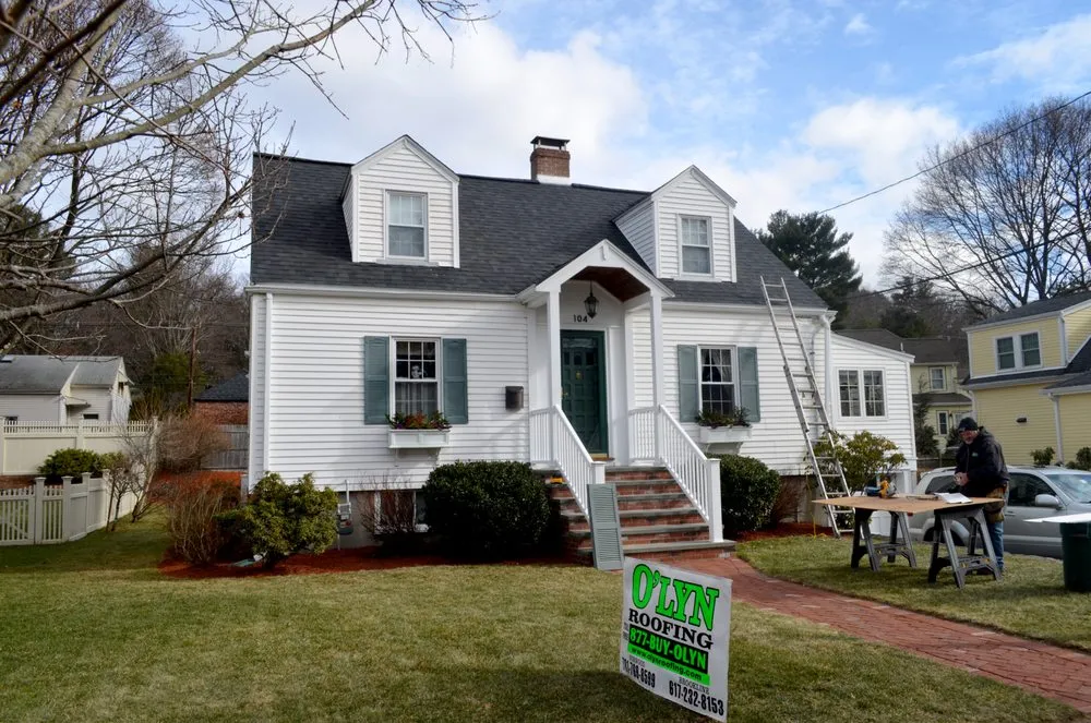 Slide of O'LYN Roofing