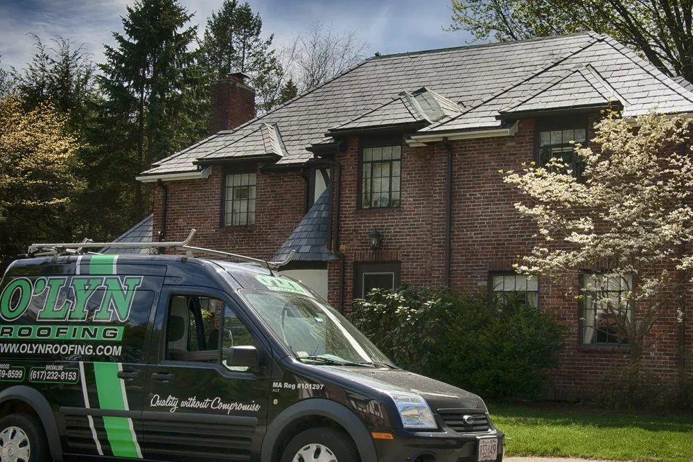 Slide of O'LYN Roofing