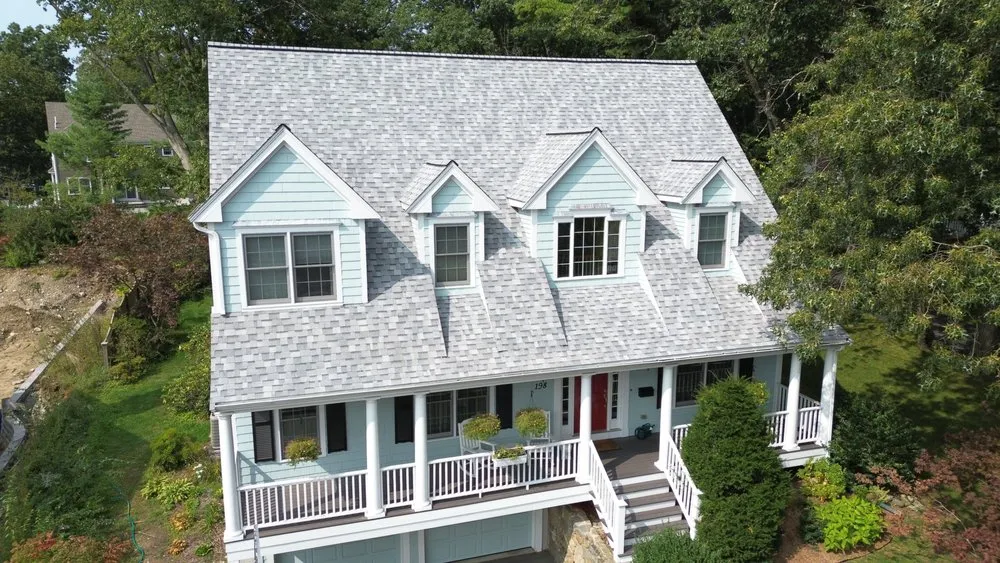 Slide of O'LYN Roofing