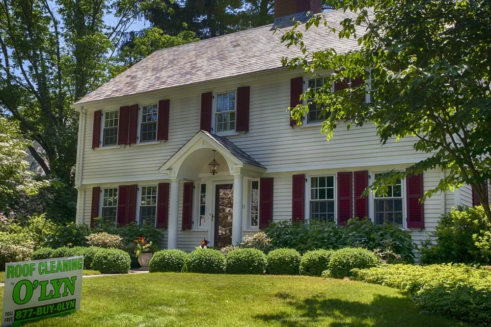 Slide of O'LYN Roofing