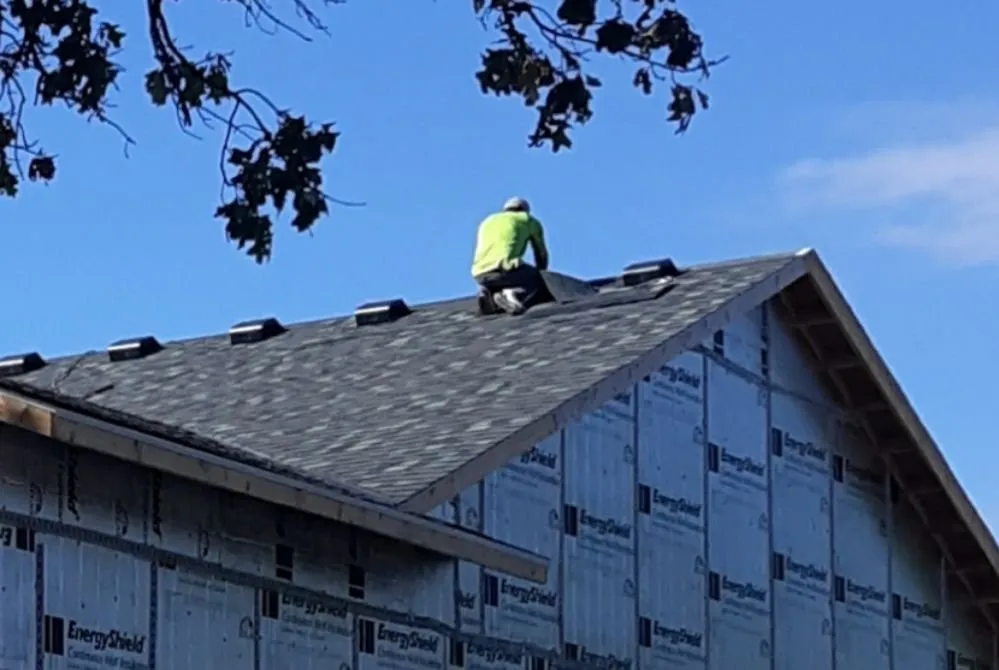 Slide of Omaha Roofers
