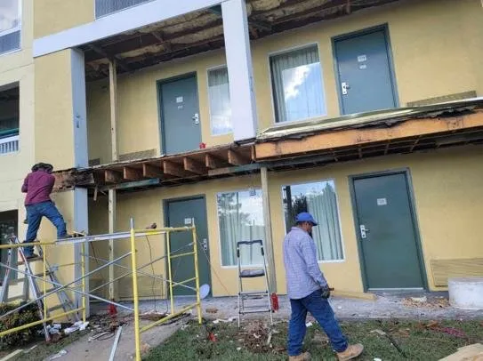 Slide of Omar's Home Improvement