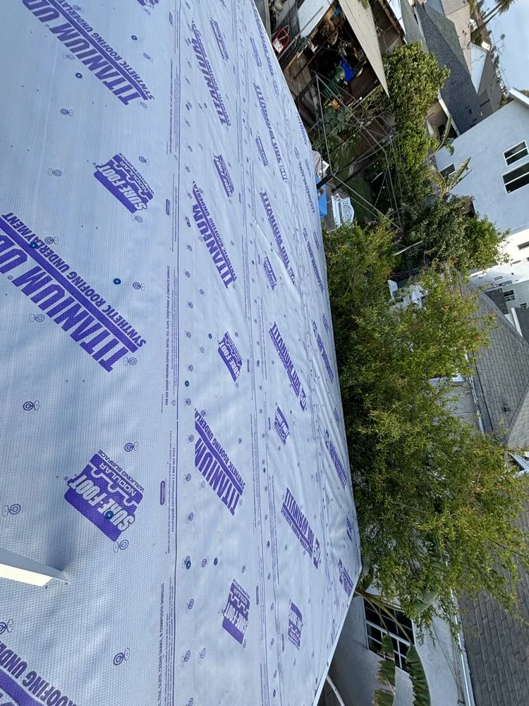 Slide of OMC Roofing