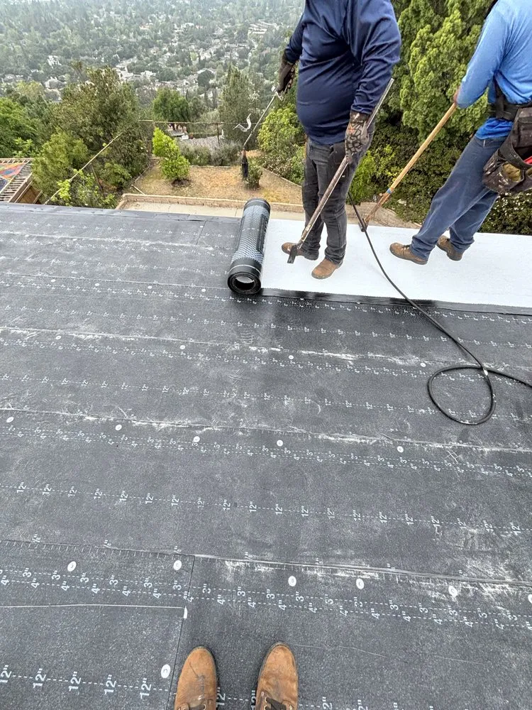 Slide of OMC Roofing