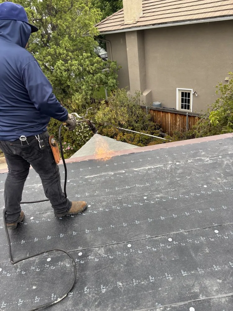 Slide of OMC Roofing