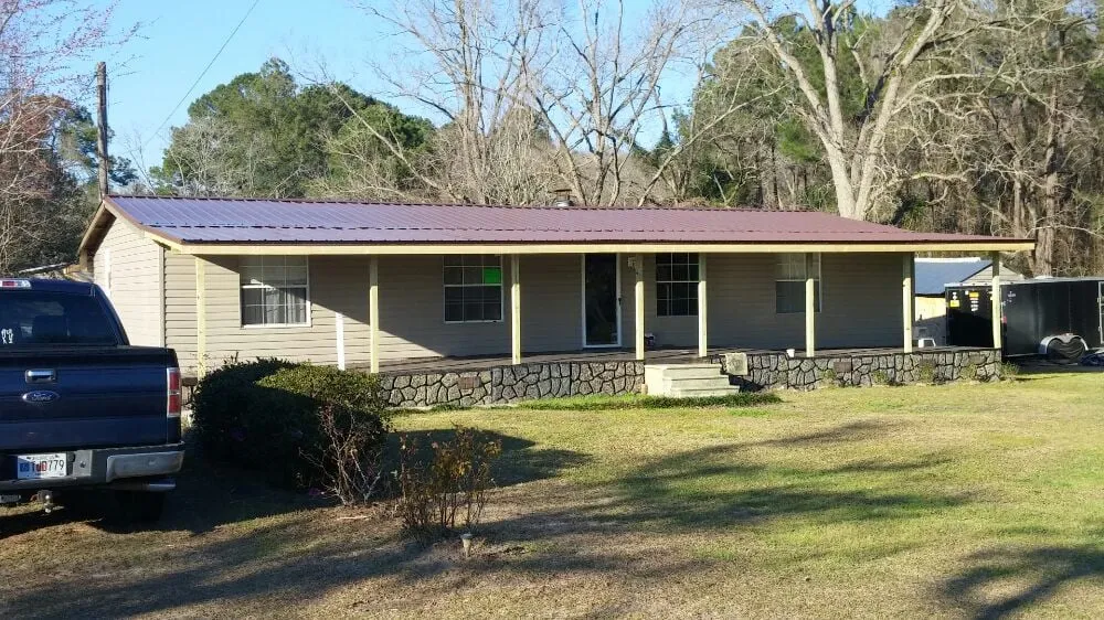 Slide of Omega Metal Roofing