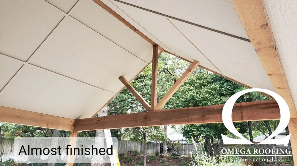 Slide of Omega Roofing and Construction