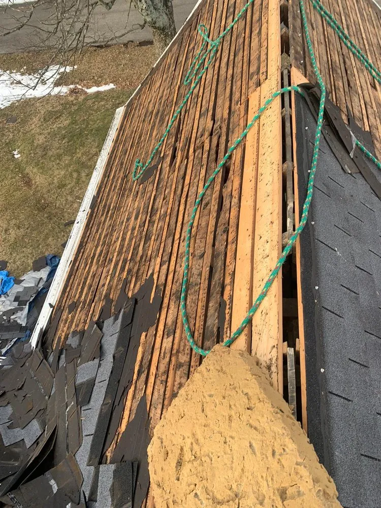 Slide of OML Garcia Roofing