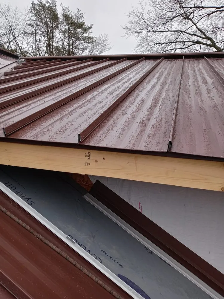 Slide of OML Garcia Roofing