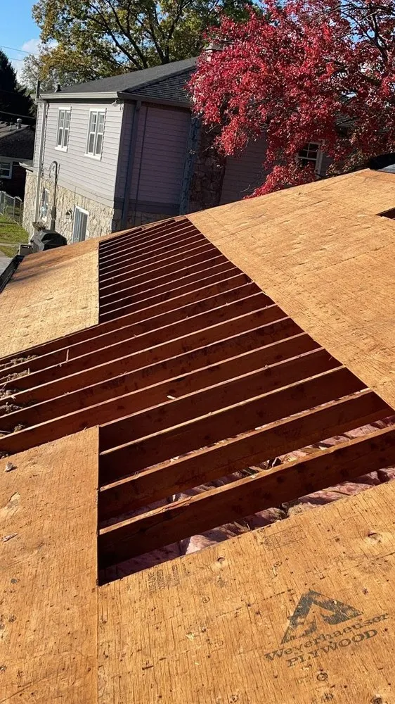 Slide of OML Garcia Roofing