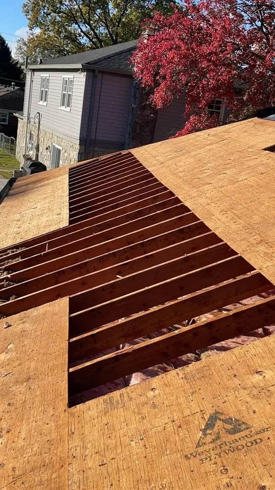 Slide of OML Garcia Roofing