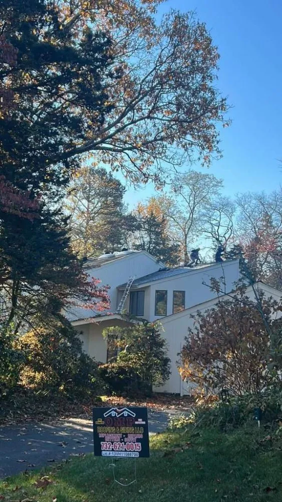 Slide of OMP Roofing and Siding