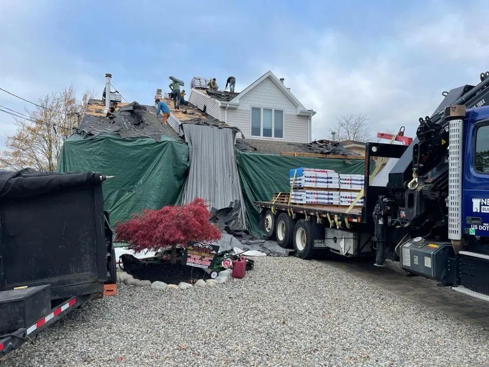 Slide of OMP Roofing and Siding