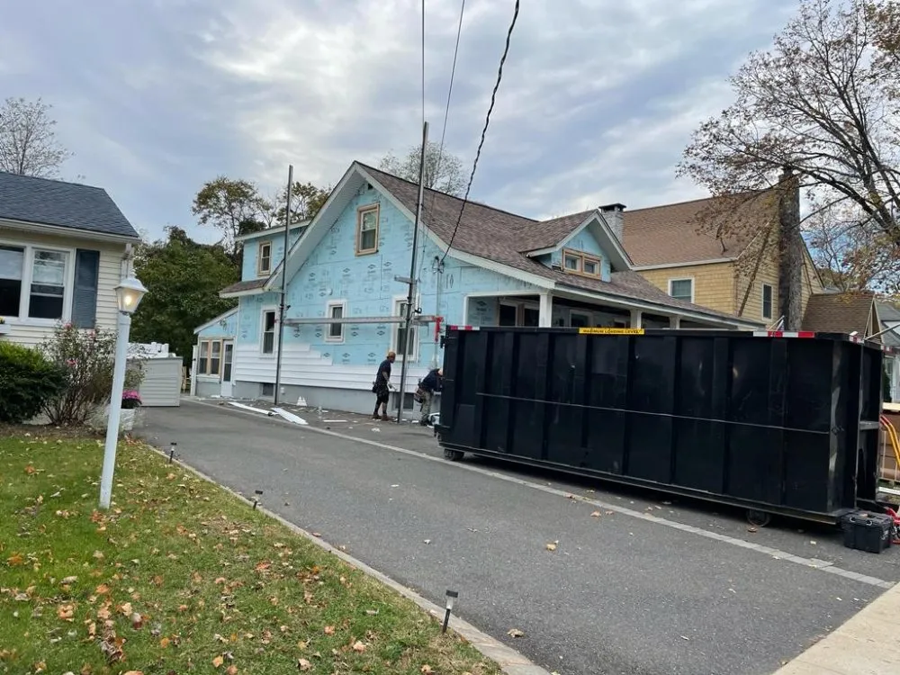 Slide of OMP Roofing and Siding