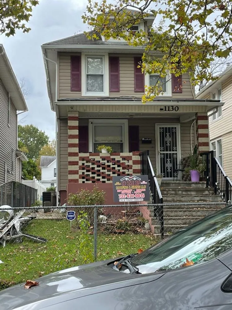 Slide of OMP Roofing and Siding