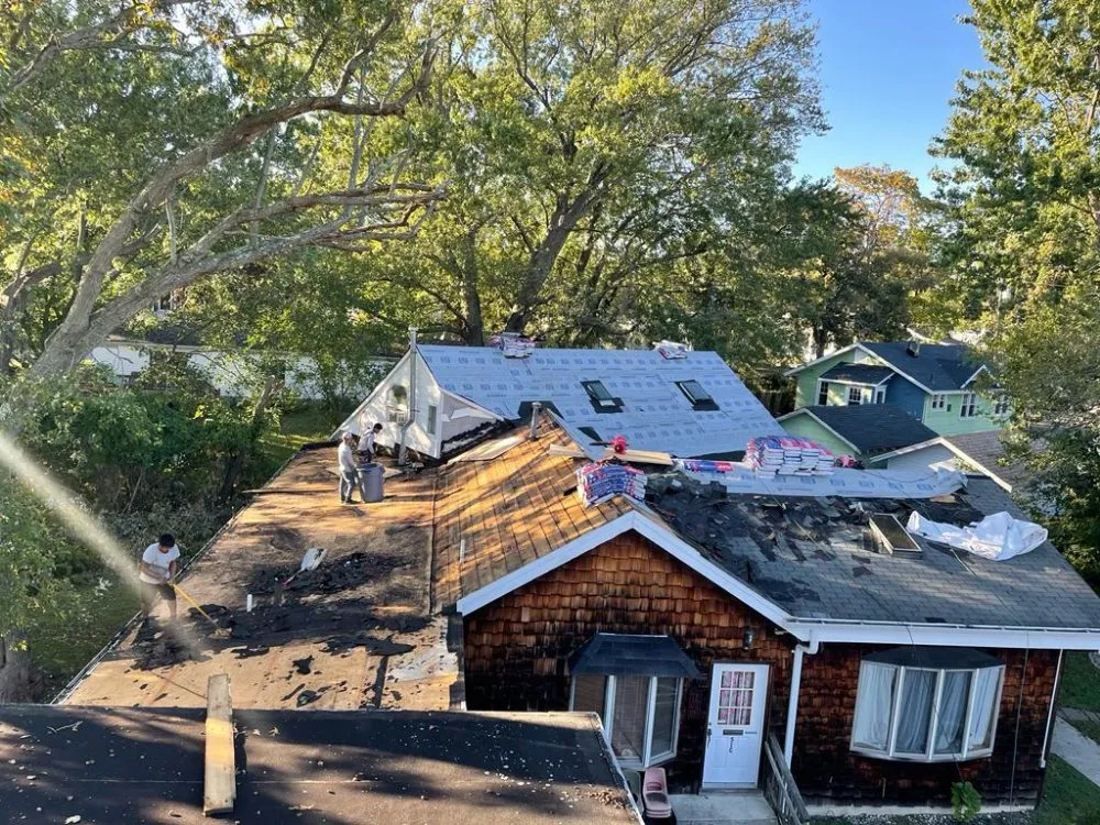 Slide of OMP Roofing and Siding