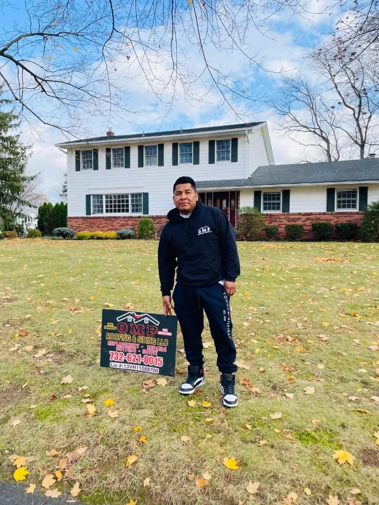 Slide of OMP Roofing and Siding