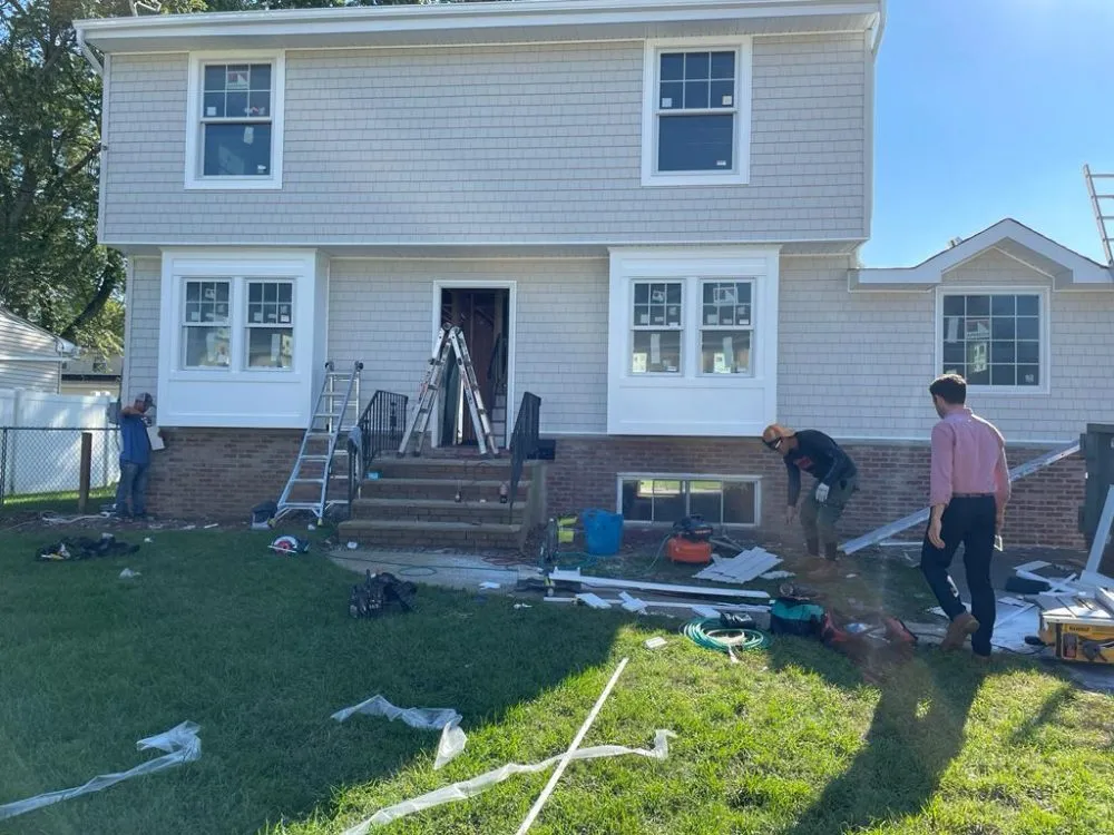 Slide of OMP Roofing and Siding