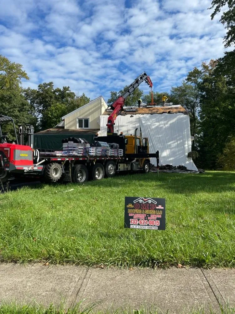 Slide of OMP Roofing and Siding