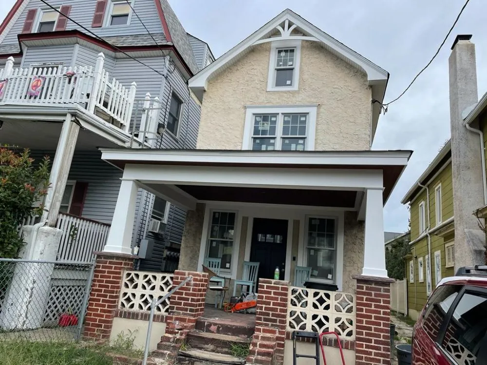 Slide of OMP Roofing and Siding