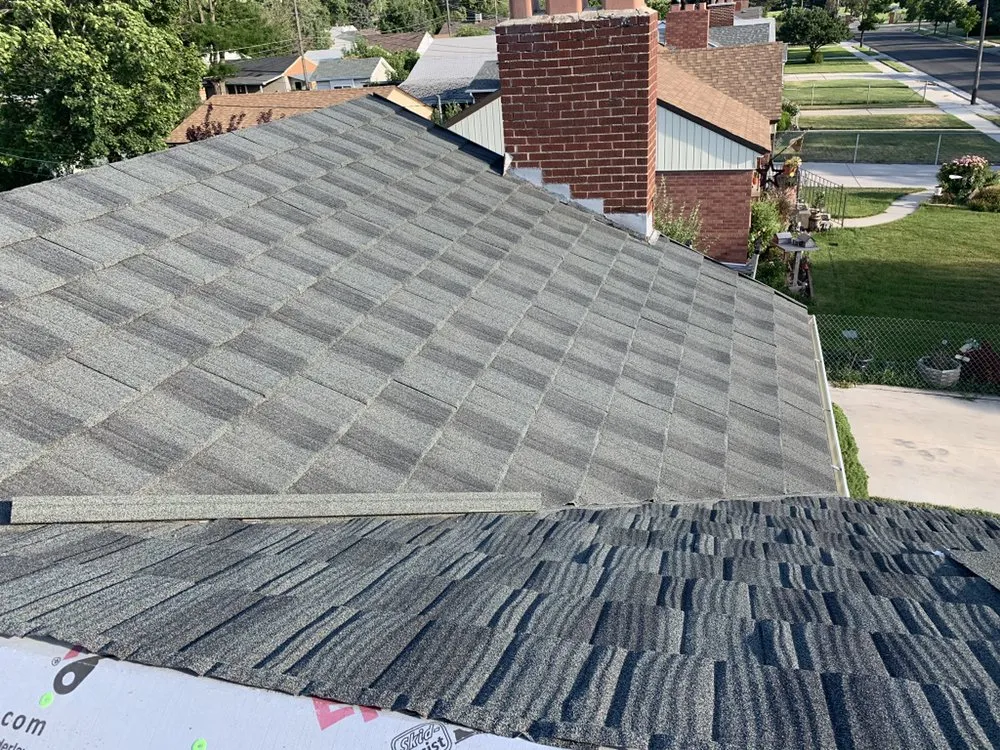 Slide of On Call Roofers