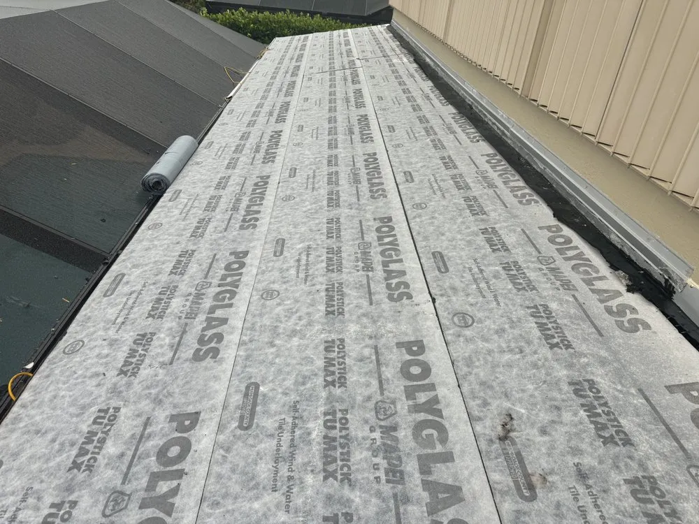 Slide of On Point Roofing