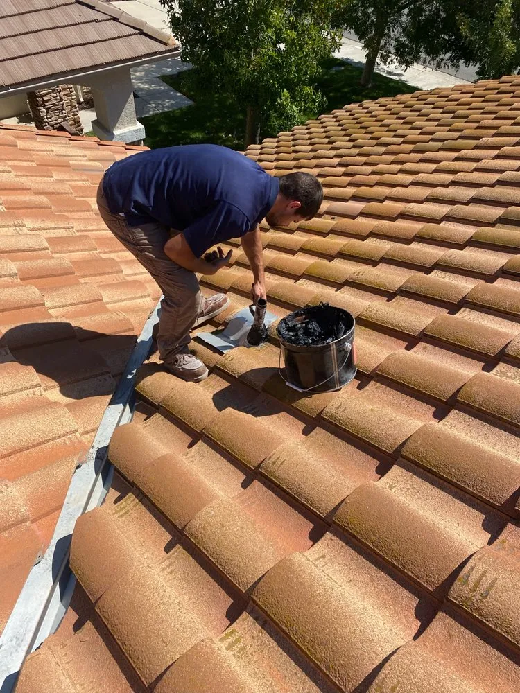 Slide of On Point Roofing Repair