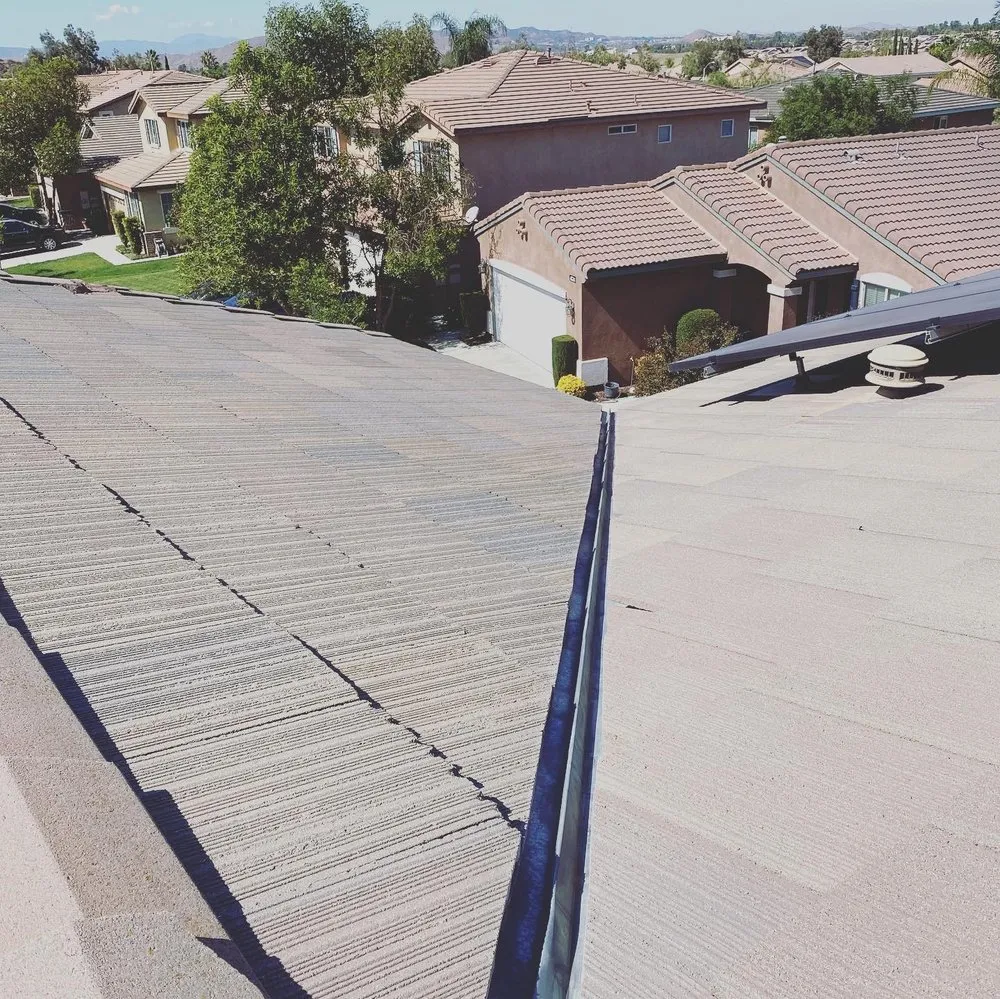 Slide of On Point Roofing Repair