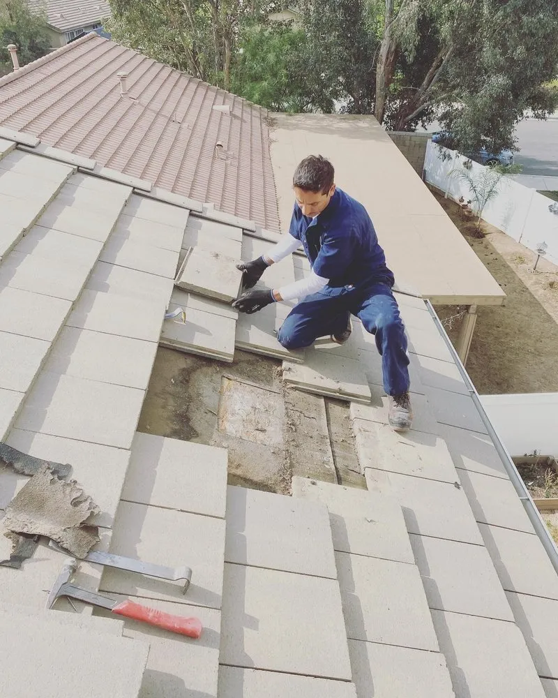 Slide of On Point Roofing Repair