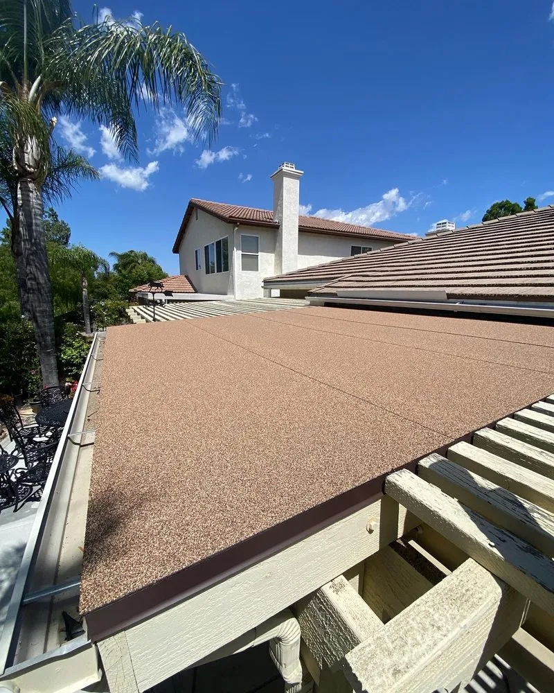 Slide of On Point Roofing Repair