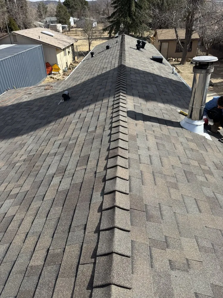 Slide of On Point Roofing Repair