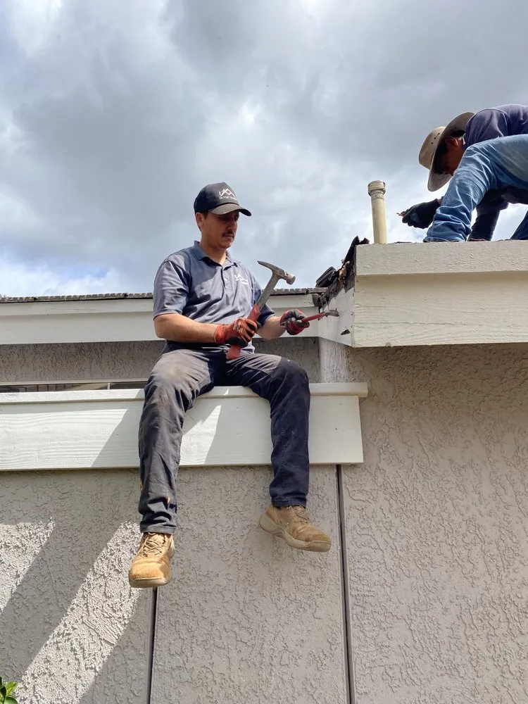 Slide of On Point Roofing Repair