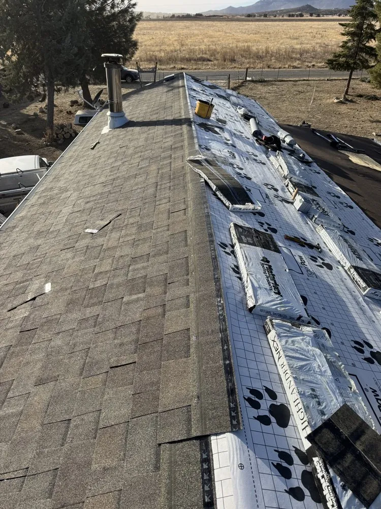 Slide of On Point Roofing Repair