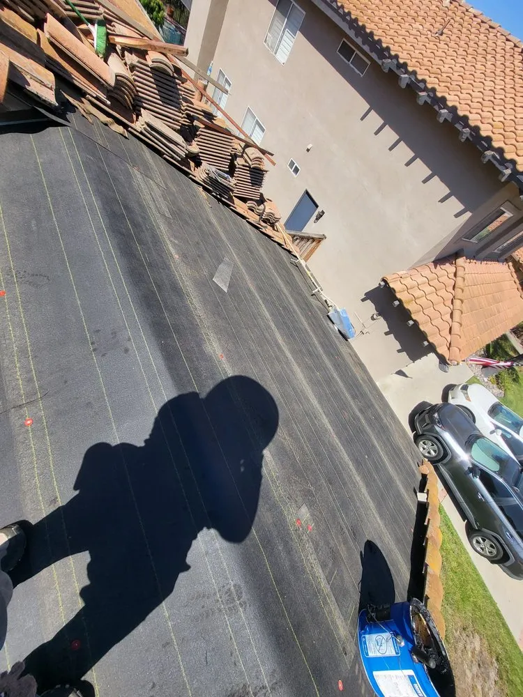 Slide of On Point Roofing Repair