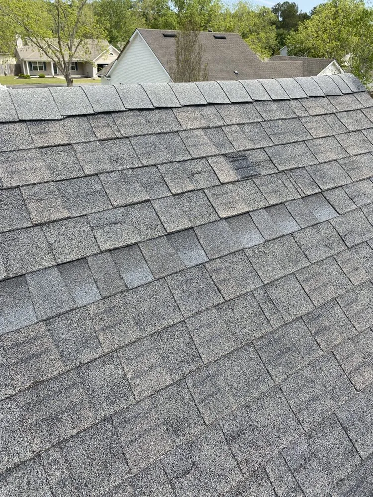 Slide of On Point Roofing