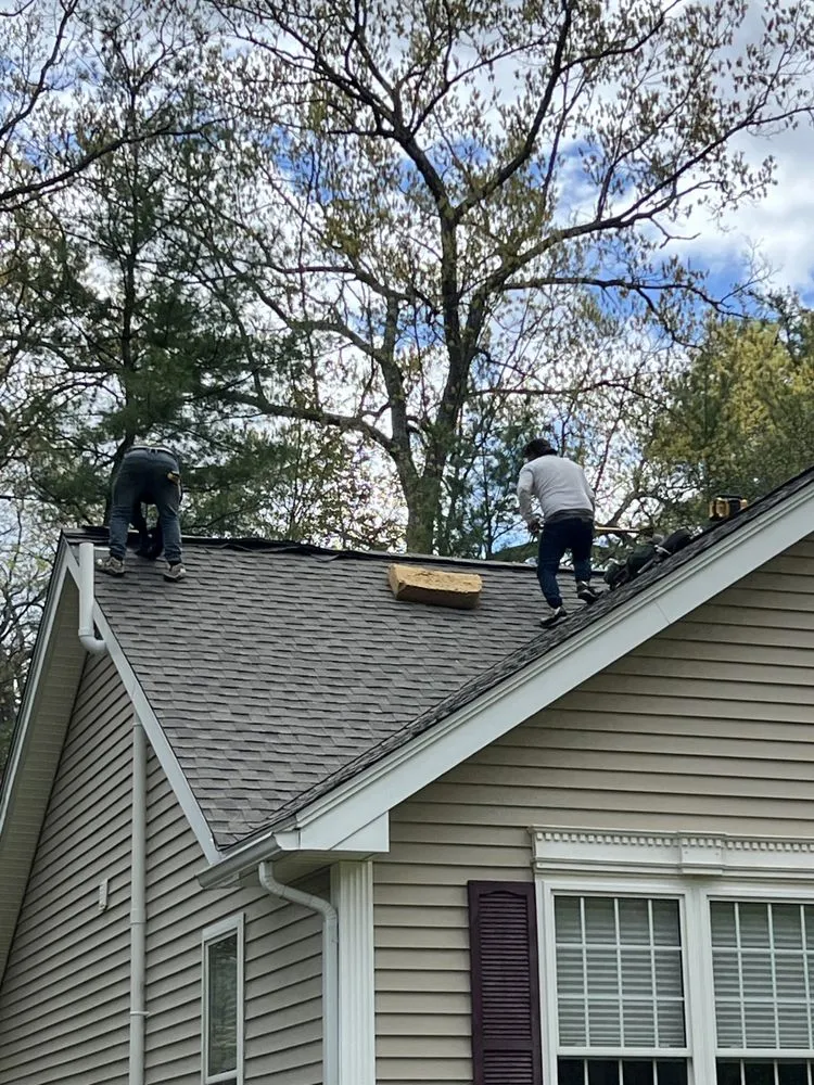 Slide of On The Mend Roofing
