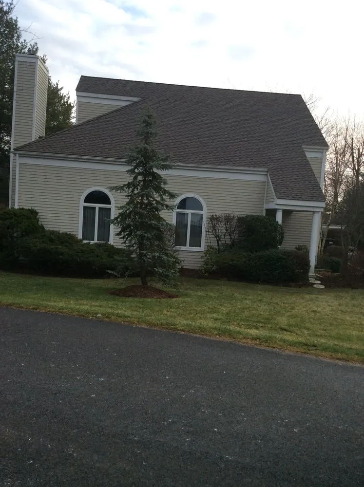 Slide of On Time Roofing