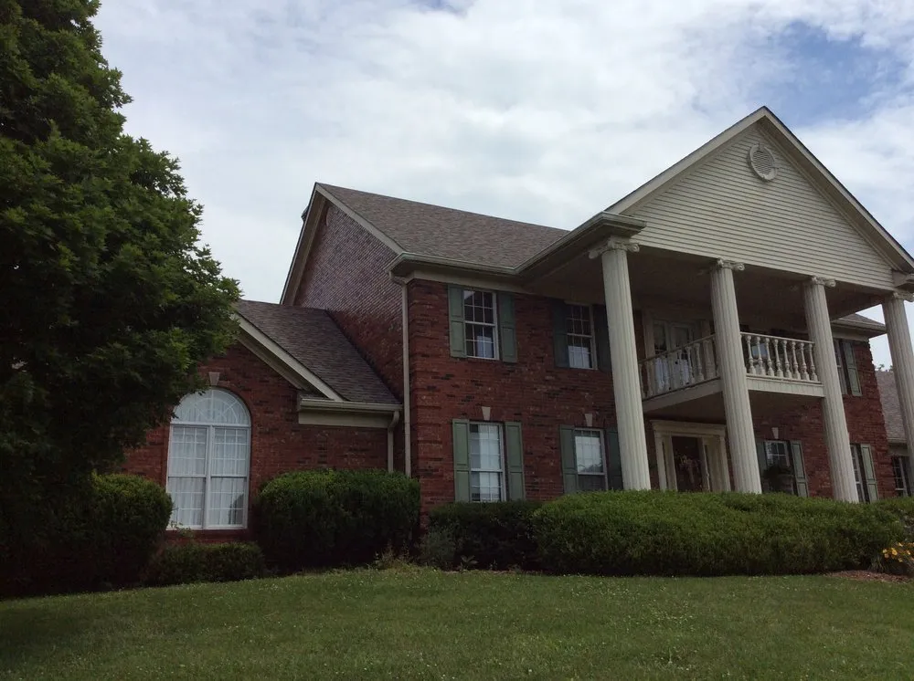 Slide of On Top of It Roofing and Construction