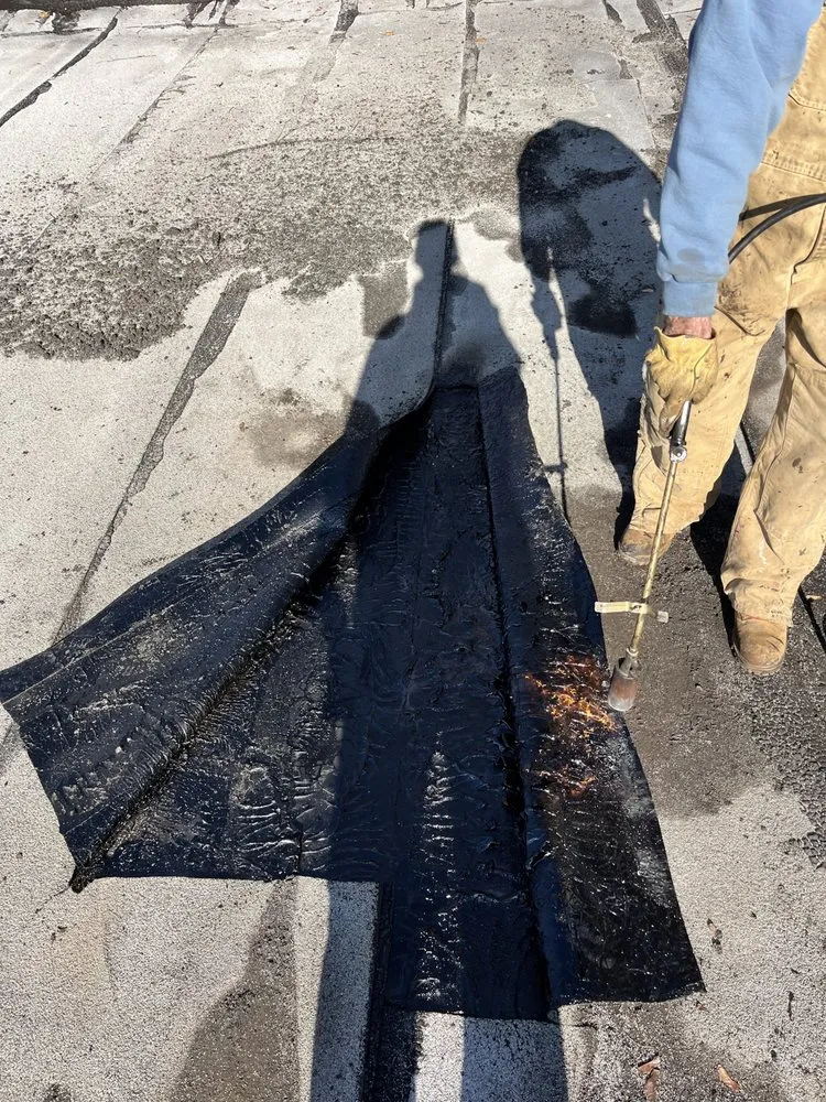 Slide of On Top Roofing