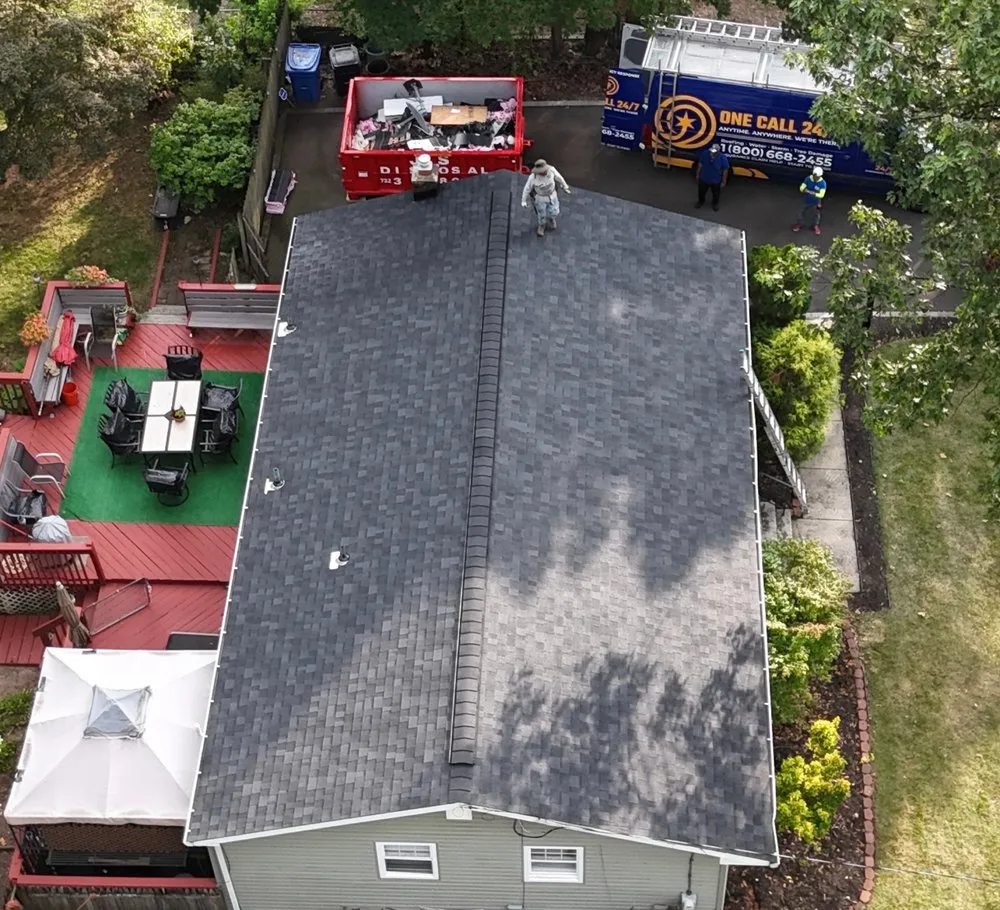 Slide of One Call 24/7 Roofing & Restoration